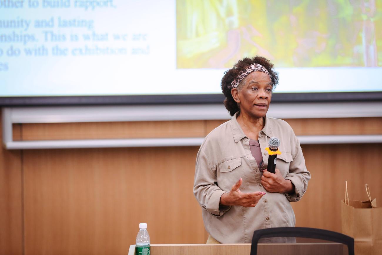 Dr. Peggy Blood is talking to the audience